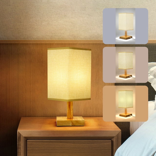 Table Lamp For Bedroom 3 Way Dimmable Nightstand Lamp with a round flaxen fabric shade and solid wood base, shown on a wooden nightstand in a cozy bedroom setting. The lamp features three brightness levels (warm, unisex, white) and includes an LED bulb. The main image highlights the lamp's warm glow, while additional images showcase its dimmable light settings.