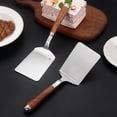 thumbnail image 4 of PRETXORVE A Stainless Steel and Wooden-handled Kitchen Spatula Is A Small Household Kitchen, 4 of 9