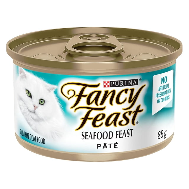 Fancy Feast Pate Fruits de Mer, Nourriture Humide pour Chat 85 g en Conserve avec Couvercle à Languette Dorée, Présentant une image de Chat Blanc et la Marque Purina, Étiquetée comme pâté de Fruits de Mer Gastronomique Sans Agents de Conservation Ni Colorants Artificiels, Offrant une nutrition Équilibrée et des Vitamines Essentielles pour Chats Adultes.