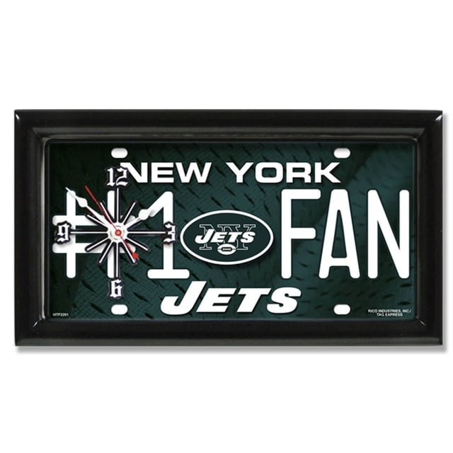 NFL New York Jets Wall Clock with a 1-inch black satin-finished frame mounted on a rectangular metal license plate. The clock features white 12, 3, 6, and 9 numerals in a starburst design on a dark green textured background with Jets logo and 'New York #1 Fan' text. Measures 7 by 13 inches, quartz movement, runs on AA battery (not included), suitable for fan caves or offices.