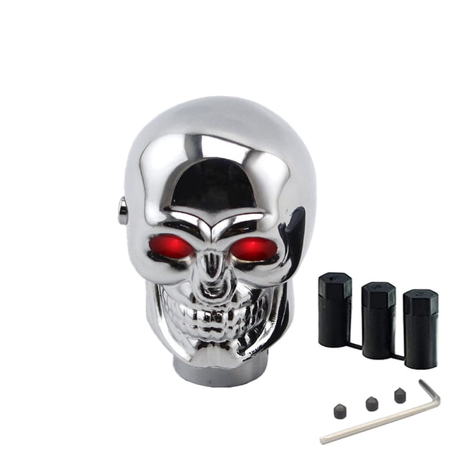 EGNMCR Skull Shifter Knob for most automatic transmissions, featuring a polished metal skeleton head with light-up eyes in red and blue. Includes screws, hex wrench, and rubber adapters for universal fitment in cars, SUVs, and trucks. Ideal as a unique gear shift knob and transmission accessory.