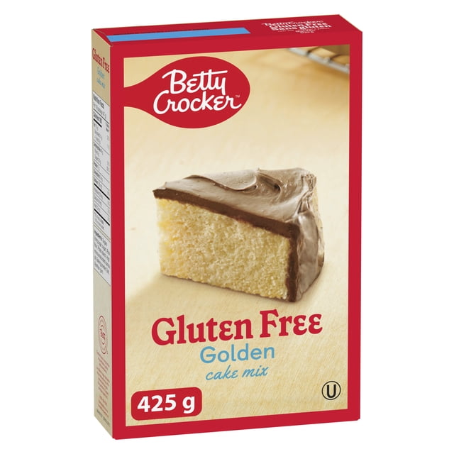 Betty Crocker Gluten Free Golden Cake Mix box showing a front view with a slice of golden cake topped with chocolate frosting on a light wooden surface, 425 g gluten free baking ingredient suitable for making soft, moist cakes at home.