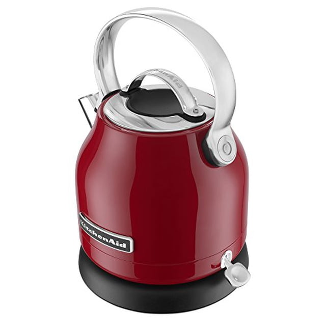 KitchenAid® 1.25 L Electric Kettle in glossy red with a rounded stainless steel handle and removable lid, on a black base with a silver on/off switch and KitchenAid logo, featuring a compact, stylish design for easy water heating and pouring.