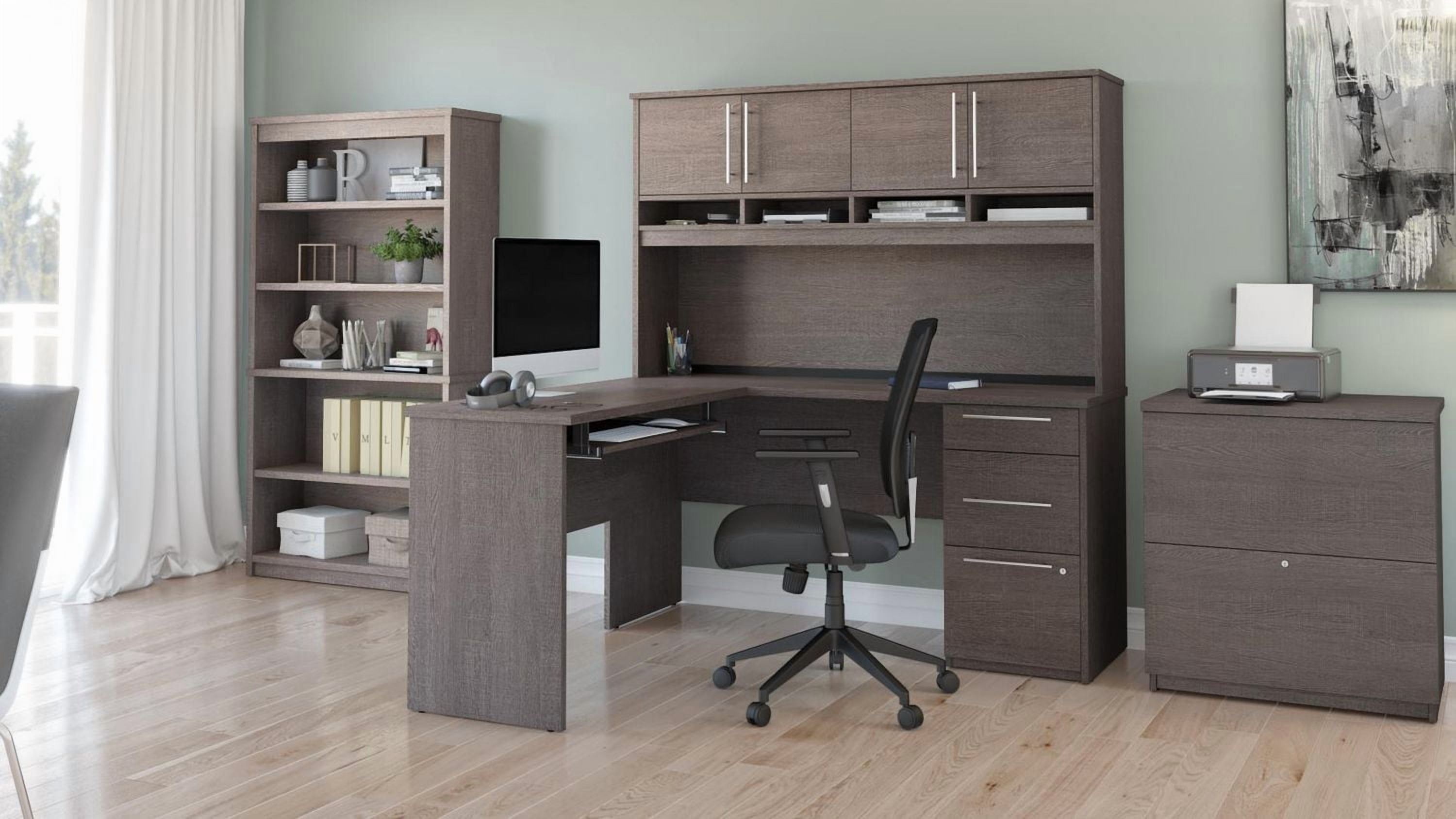 Bureau en L 60L avec huche, classeur latéral et bibliothèque Innova de Bestar, gris écorce