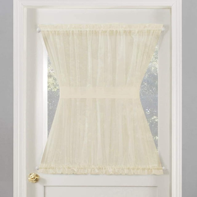 SUN TEXTILE VOILE ROD POCKET DOOR PANEL CURTAIN in sheer ivory voile fabric with rod pockets for curtain rods up to ¾ inch, cinched at the center with a matching tie-back, gently filtering light through a white door window, ideal for privacy and layering in home window coverings.