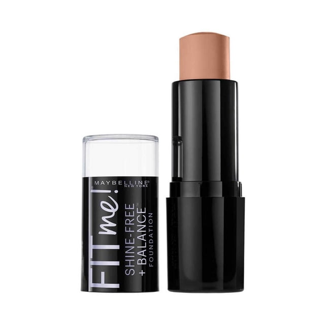 Maybelline New York Fit Me®, Shine-Free + Balance®, Stick Foundation, 9 gr, shown with the cap removed revealing a medium beige foundation stick in a black cylindrical tube with a clear cap labeled with the product name, providing lightweight, oil-absorbing medium coverage for a natural matte finish suitable for sensitive skin.