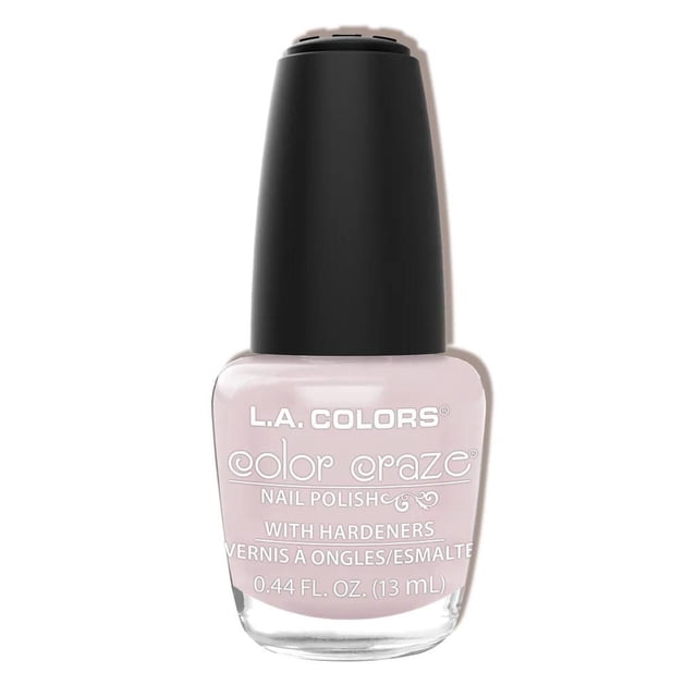 COLOR CRAZE NAIL POLISH - IN THE NUDE by L.A. COLORS, a 13 ml bottle of light pink nail polish with hardeners in a clear glass bottle and black cap, formulated to strengthen and protect nails while providing a durable, vivid colour ideal for fingers and toes, often used to add subtle elegance to manicures and pedicures.