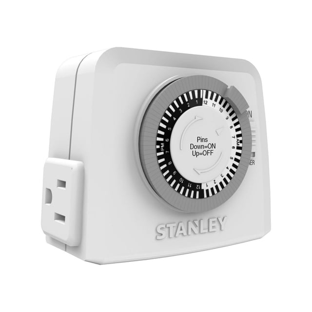 Stanley TimeIt Twin 2-Outlet Grounded Indoor Mechanical Timer with white rectangular body, featuring a 48-pin dial for setting multiple daily ON/OFF intervals in 30-minute increments, two grounded outlets on the side, and a manual ON switch, rated for heavy-duty 15 amp power load and CETL approved.