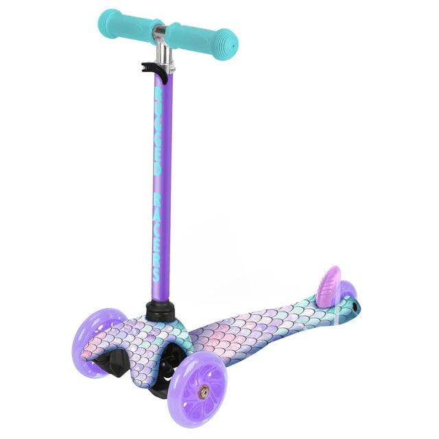 Rugged Racers Mini 3-Wheel Kids Scooter With Mermaid Print Design with a purple adjustable handlebar featuring turquoise grips and brand name text, a wide deck decorated with pastel mermaid scales, and translucent purple motion-activated LED wheels, suitable for children aged 3 to 6 years.