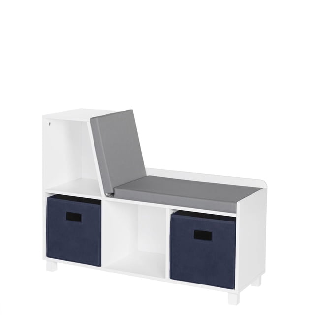 RiverRidge Home Book Nook Collection Storage Bench with Cubbies in white with gray padded seat and backrest, two navy blue fabric storage bins in lower cubbies, and open middle cubby for extra storage, made of painted MDF, ideal for kids' playrooms or bedrooms.