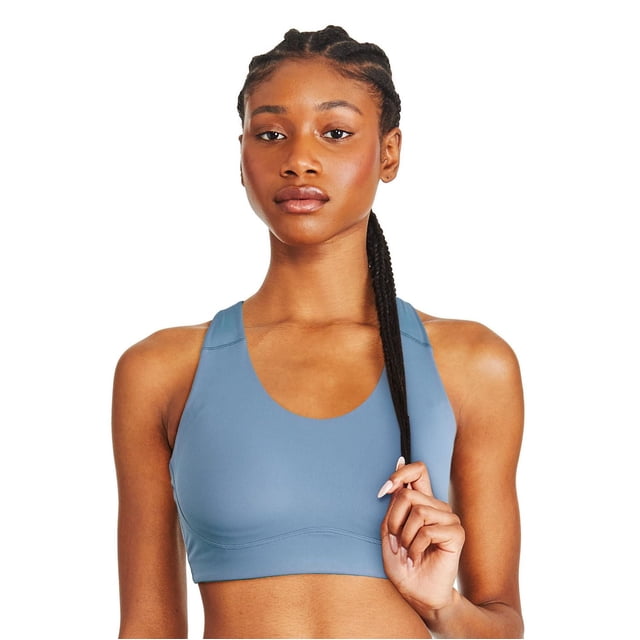 Athletic Works Women's Sports Bra in blue with a round neckline and sleeveless design, made of microfiber knit fabric, featuring adjustable criss-cross back straps and pull-on style, shown on a model from the front holding a braid.