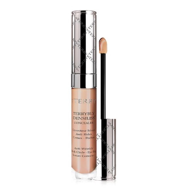 BY TERRY Terrybly Densiliss Concealer - 6 - Sienna Copper (7 ml.) A slim tube concealer in warm sienna copper for under-eye and spot correction; smooth, fluid texture with matte, second-skin coverage using fine mineral pigments to conceal lines and discoloration, often used as a suitable portable touch-up for minor blemishes.