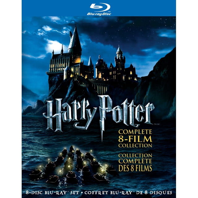 Harry Potter: The Complete 8-Film Collection (Blu-Ray) cover featuring Hogwarts castle illuminated at night atop a rocky cliff, with small boats carrying wizards holding lanterns crossing a dark lake under a starry sky, Blu-ray Disc logo at the top, and text highlighting the 8-disc set in English and French, ideal for fantasy movie collectors.