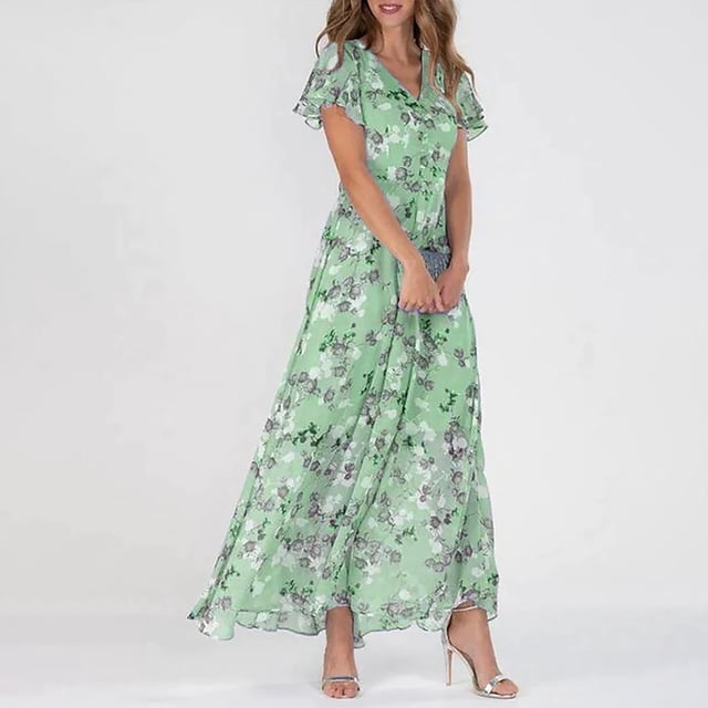 LOVZFMLL Robe Aguichant Mode Décontractée Imprimée Ajustée pour Femme à Manches Courtes, Col en V, Longueur Genou, en Vert, Taille 2TG. la Robe Présente un Imprimé floral, des Manches Courtes Volantées et un Col en V, Conçue pour une Coupe Ajustée. Elle Est Longueur Genou et Fabriquée en Matériau Léger et Confortable, Idéale pour les occasions de Printemps et d'Été. le Modèle Est Montré Portant la Robe avec des Talons Argentés dans un Cadre de studio.