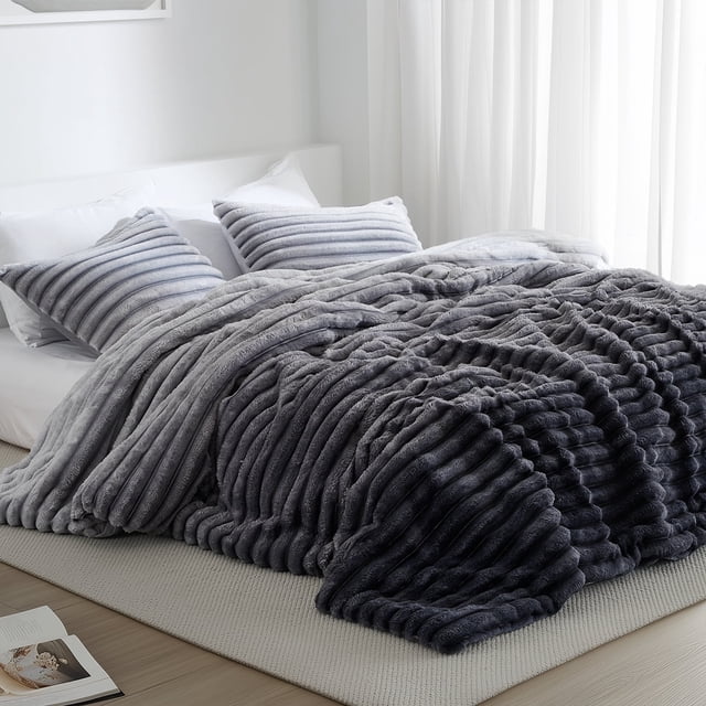 Regency Heights King/Cal King Size Comforter Set in grey ombre, designed for kids' bedding, featuring a fluffy ribbed plush texture with chunky cord design. Includes a comforter (104"W x 90"L) and two shams (20"W x 36"L) with overlapping enclosures. Made with premium 300 gsm fabric for extra weight, softness, and warmth, and Oeko-Tex certified for safety and skin gentleness. Displayed on a bed in a bright, minimalist room with white curtains and a neutral rug.