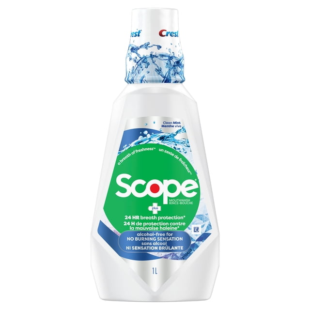Crest Scope Breath Protection Alcohol Free Mouthwash in a 1L white plastic bottle with green and blue label featuring water splash graphics, providing 24-hour breath protection and alcohol-free formula for no burning sensation and whole mouth clean.