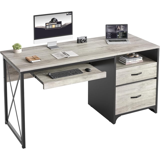 Bestier 55 inch Computer Desk with Drawers Keyboard Tray Home Office Desk in grey oak finish, designed for home office use. Features a pull-out keyboard tray, two drawers for organizing legal or letter-size papers, and durable CARB P2 wood construction. Supported by black metal legs with X crossbars for stability, suitable for office furniture setups.