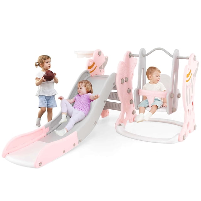 Costway Toddler Slide and Swing Set 4-in-1 Indoor Playground in pink, featuring an extended slide with scientific zoning, a swing with an anti-falling baffle, a climbing ladder with non-slip steps, and a basketball hoop. The set is designed for children aged 18 months and older, promoting motor skills and imaginative play. Made from BPA-free materials, it includes a basketball and pump for added fun.