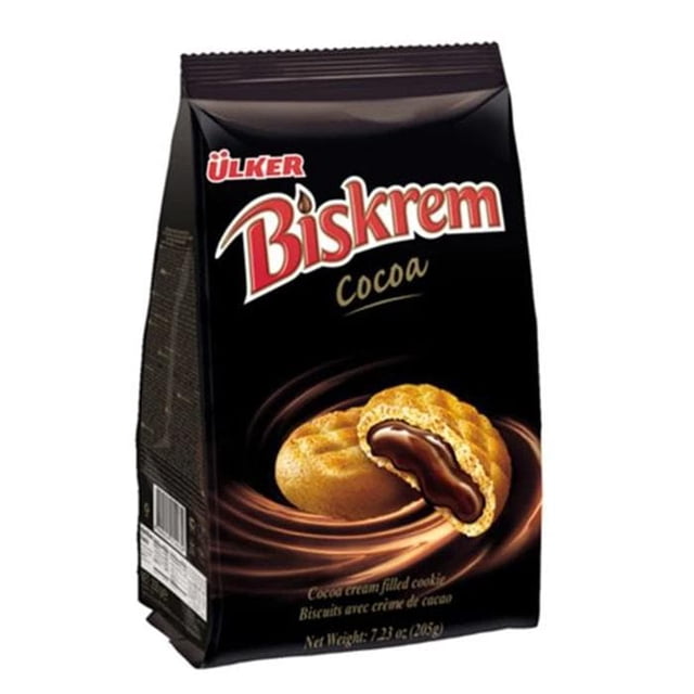 ULKER BISKREM F Cacao Crème de Cacao biscuits Fourrés dans un Emballage Noir Montrant Deux biscuits Ronds Dorés, un Brisé pour Révéler une Garniture de Cacao Foncé Lisse, Idéal pour une Collation Sucrée Ou un dessert.