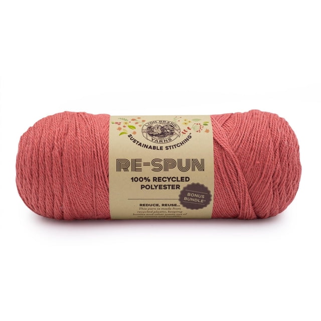 Lion Brand Re-Spun Bonus Bundle Yarn in heliotrope, a 284-gram skein of worsted weight 100% recycled polyester yarn with a soft texture, machine washable and dryable, wrapped in a beige label highlighting sustainable stitching and eco-friendly materials, ideal for knitting garments, accessories, and home décor projects.