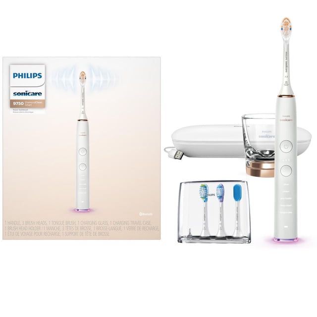 Philips Sonicare DiamondClean Smart 9750 Rose Gold rechargeable electric toothbrush with white handle and rose gold accents, featuring five brushing modes and smart brush head pairing. Includes a USB charging travel case, charging glass, and clear holder with three brush heads plus a tongue cleaner, designed for advanced oral care with Bluetooth connectivity.