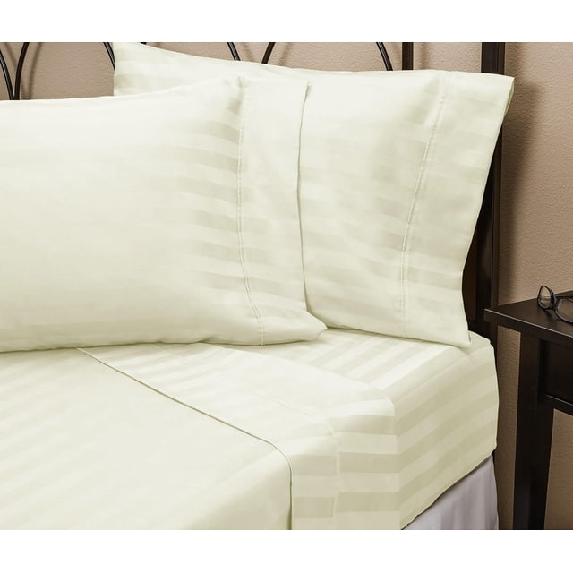 Johnson Home 400 Thread Count Cotton Sheet Set Damask Stripe in cream with subtle horizontal damask stripes, featuring two pillowcases and a fitted sheet on a bed with a dark metal headboard, ideal for adding breathable comfort and durability to bedroom bedding.
