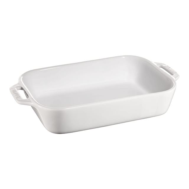 STAUB Ceramique 2,4 L Ceramic Rectangular Oven Dish in white, designed for baking, gratins, and desserts. Features ergonomic handles, a smooth enamelled surface, and dimensions of 27 cm x 20 cm. This versatile bakeware is stackable for space-saving storage and suitable for serving meals directly at the table.