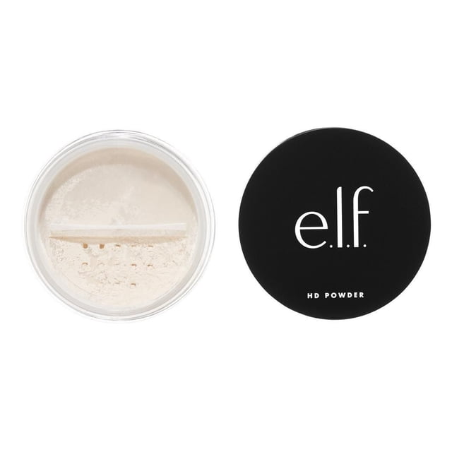 e.l.f. Cosmetics High Definition Powder translucent loose setting powder in a clear round container with sifter and black lid featuring the e.l.f. logo and HD Powder text, designed to mask fine lines and create a radiant complexion, often used to set makeup for a flawless finish.