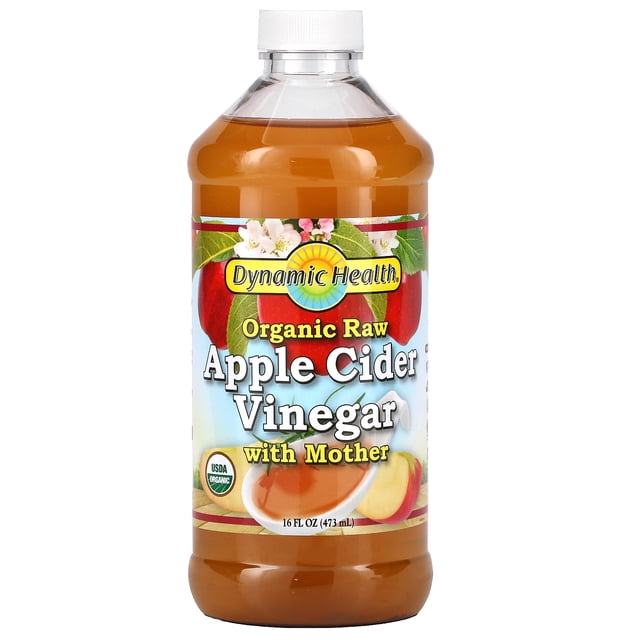 Dynamic Health Laboratories Organic Raw Apple Cider Vinegar with Mother, 16 fl oz (473 ml) bottle. The label features vibrant apple imagery, USDA Organic certification, and highlights that it is raw, unfiltered, unpasteurized, and made from organic certified apples. The bottle has a clear plastic design with a white cap.