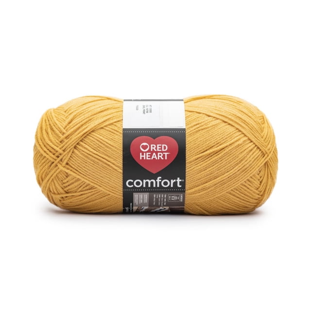Red Heart® Comfort® Yarn, Solid, Acrylic #4 Medium, 16oz/454g, 867 Yards in mustard yellow, a large skein with a black label featuring the Red Heart logo and product details, ideal for knitting, crochet, and suitable for making cozy throws and blankets.