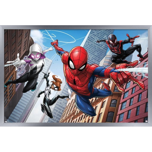 Marvel Comics - Spider-Man - Web Heroes Wall Poster, 22.375" x 34", silver framed, depicting four Spider-Man characters swinging through a cityscape with tall buildings. Classic Spider-Man in red and blue shoots web from his right hand at the center. Spider-Gwen in white and black with pink accents and glowing eyes is on the left, Spider-Woman in black and white with flowing brown hair below her, and Miles Morales in black and red on the right also shooting web. The satin finish and lightweight frame make it suitable for bedroom, office, or dorm wall decor.