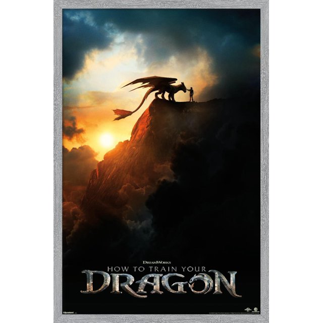 How To Train Your Dragon (2025) - Teaser One Sheet Wall Poster featuring a silhouetted dragon and person on a rocky mountain peak at sunset with dramatic clouds, framed in light gray wood. This framed poster print suits wall art décor for bedrooms, offices, or dorms.
