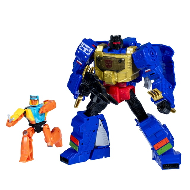 Transformers Age of the Primes Leader Class G2 Universe Grimlock action figure in robot mode with articulated limbs and a cannon blaster accessory, standing beside a smaller orange and blue robot figure, suitable for battling toys and action figure collections.