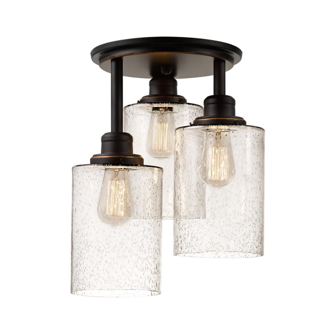 Annecy 3-Light Oil-Rubbed Bronze Semi-Flush Mount Ceiling Light with three cylindrical seeded glass shades hanging from a round oil-rubbed bronze base, each containing a vintage Edison bulb, suitable for rustic hallway or entranceway lighting.