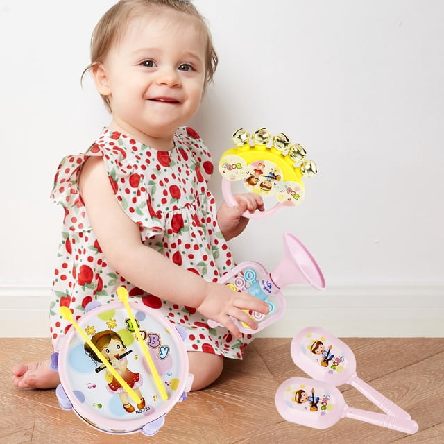 Apmemiss Christmas Gifts Clearance Musical Toy Set featuring a hand pat drum, rattle, and trumpet, designed for infants. The set is made of safe ABS plastic with smooth, rounded edges, ideal for early learning and sensory development. The image shows a baby playing with the colorful toy set, which includes a drum with yellow drumsticks, a yellow rattle, and a pink trumpet. Suitable for boys and girls aged 6-36 months, this set promotes fine motor skills, rhythm perception, and auditory stimulation. Perfect for gifting on special occasions like Christmas or birthdays.