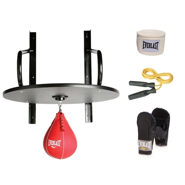 Everlast Sport Advanced 6 Piece Speed Bag Set with a 24-inch adjustable black wooden platform mounted with a red speed bag on a standard swivel, including black speed bag gloves with orange stitching, white Everlast hand wraps, and a yellow jump rope with black handles, suitable for boxing, cardio, and strength workouts.