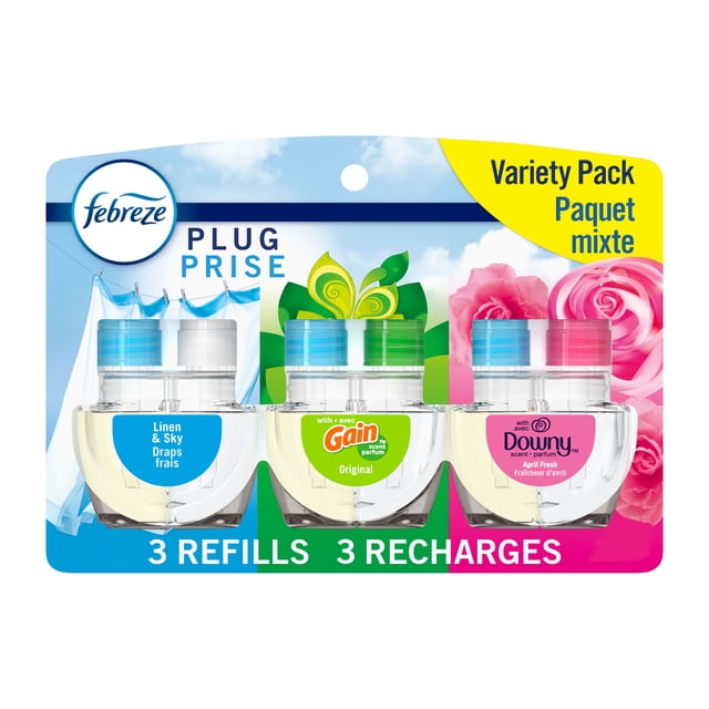Febreze Plug In Air Freshener variety pack containing three clear oil refills in Linen & Sky, Gain Original, and Downy April Fresh scents, designed for automatic scent release in home air freshener plugs with bilingual English and French packaging.