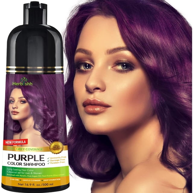 Herbishh Shampooing Couleur Violet pour Cheveux Gris, Permanent, Hommes et Femmes (500 ml). l'Image Affiche une Bouteille de 500 ml de Shampooing Couleur Violet Herbishh avec Capuchon Noir et Étiquette Violette, Formulé pour Couvrir les Cheveux Gris. le Shampooing Est Sans Ammoniaque, Sans Parabènes et Convient aux Hommes et aux Femmes. un Modèle aux Cheveux Violets Vibrants Est Montré en Arrière-Plan, Mettant en Valeur l'Effet du Produit. Ce Shampooing 3-en-1 Nettoie, Revitalise et Colore les Cheveux, Offrant des Résultats de Qualité