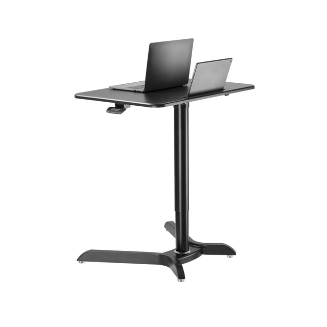 TygerClaw Sit-Stand Workstation with a matte black rectangular tabletop holding a laptop and tablet, supported by a central gas-spring adjustable column and a wide base with leveling feet, ideal as a height adjustable computer desk for ergonomic office use.