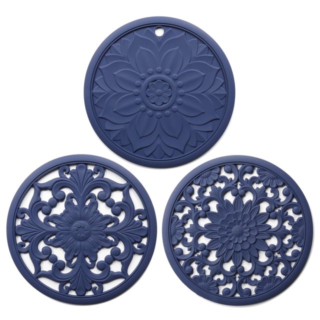 Silicone Trivets for Hot Pots and Pans Silicone Trivet Mat Set with 3 Carved Patterns. The set includes three round, navy blue silicone mats with intricate floral and decorative patterns. Each mat measures 7.87 inches in diameter and 0.21 inches thick, designed to protect countertops and tables from heat up to 482°F. Made from food-grade, BPA-free silicone, these mats are non-slip, flexible, and easy to clean, either by hand or in the dishwasher. Suitable for use as hot pot holders, coffee pot mats, or jar openers.