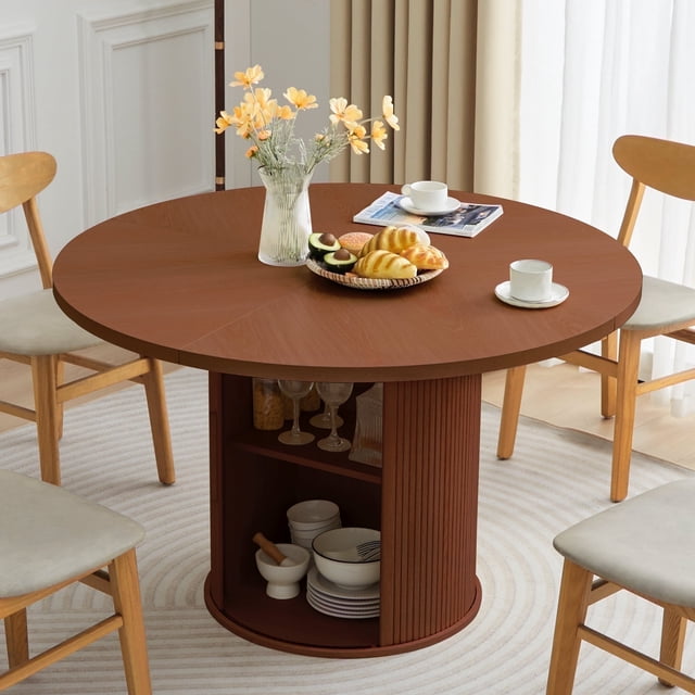 Wirrytor 47-inch round dining room table with storage, featuring a walnut finish and a modern design. The table includes a 2-layer storage shelf within its 20.5-inch diameter barrel column, surrounded by 15mm thick wooden strips for stability. The tabletop is crafted from premium MDF with a textured, heat-resistant, scratch-resistant, and waterproof surface. The base features a round metal leg for added industrial-inspired style. Ideal for seating 4-6 people, this table is perfect for family meals or small gatherings in dining rooms or kitchens.