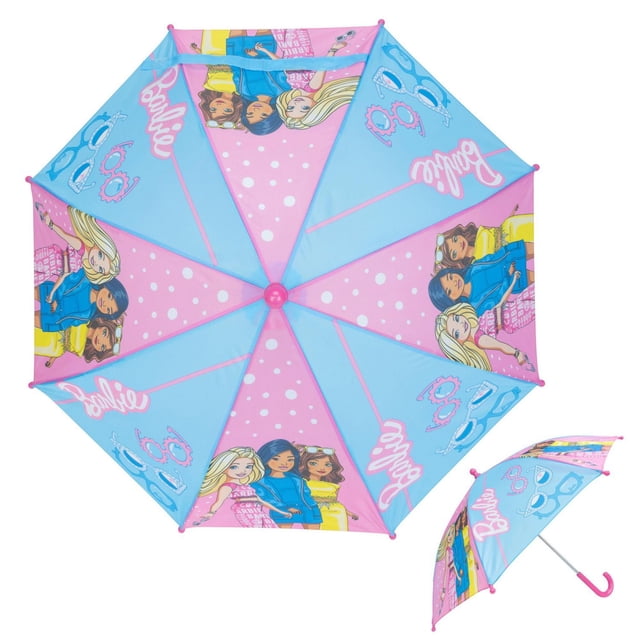 Mattel Barbie Umbrella with a pink and blue polyester canopy featuring Barbie and friends illustrations, polka dots, and logos. It includes a manual push open system, rounded safety tip, and pink J-hook handle sized for kids, suitable for rainy days and outdoor use.