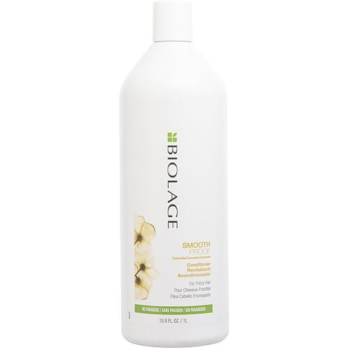 Matrix Unisex Smoothproof Conditioner 33.8 Oz by Biolage. A large white bottle with a sleek design featuring the Biolage logo and floral accents. This conditioner for frizzy hair is free of parabens and silicones, offering smooth and manageable results.