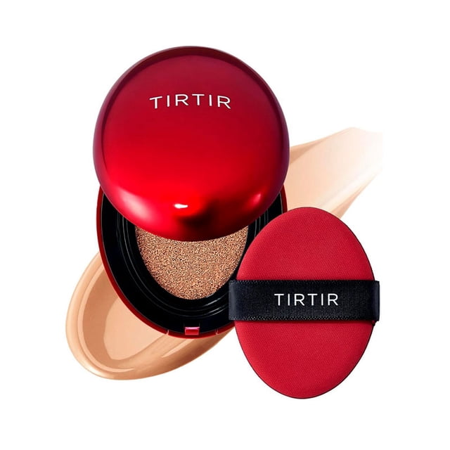 TIRTIR Mask Fit Red Cushion 18g in shade 33N Macchiato, a cushion foundation with a vibrant red compact and matching applicator puff. The product offers high coverage, a semi-matte finish, and up to 72 hours of wear. Enriched with Niacinamide, Propolis Extract, and Hibiscus Flower Extract, it nourishes and brightens the skin. The compact is displayed open, revealing the cushion foundation, with a beige swatch in the background.
