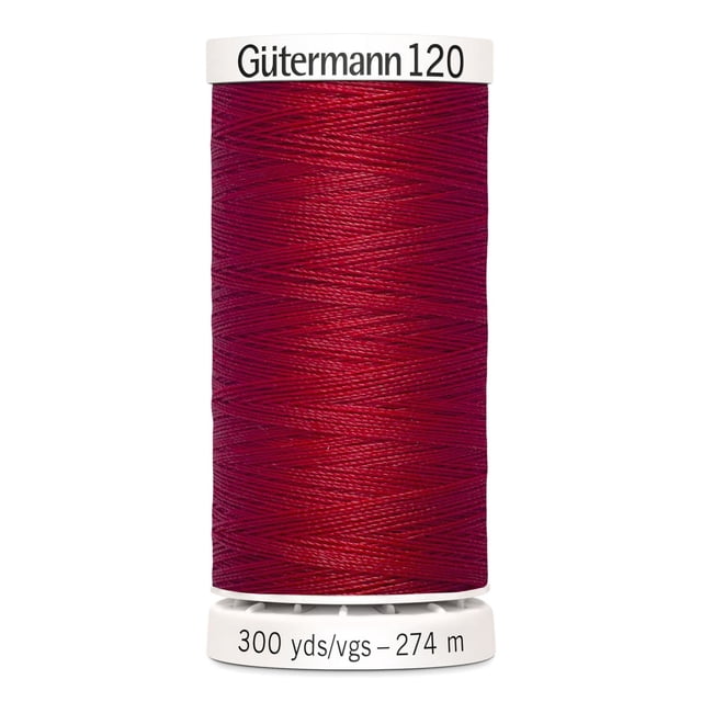 Gutermann 120 100% polyester all purpose thread spool in deep red, tightly wound on a white plastic spool labeled with 300 yards (274 meters), suitable for machine and hand sewing various fabrics including cotton, synthetics, and craft projects.