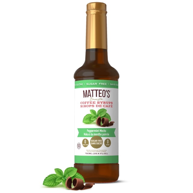 Matteo's Sugar Free Coffee Syrup in Peppermint Mocha flavor, 750mL bottle. The syrup is sugar-free, calorie-free, and keto-friendly, designed to enhance coffee with a barista-inspired taste. The bottle features a gold cap and a label with green accents, showcasing peppermint leaves and chocolate curls.