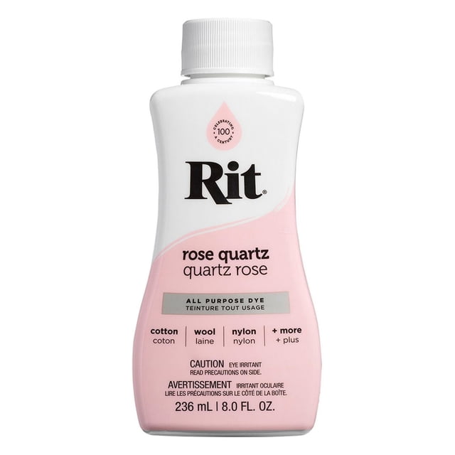 Rit All Purpose Liquid Dye in rose quartz, 236 ml (8 fl oz) bottle with white and pink label, suitable for dyeing cotton, wool, nylon, and other fabrics, featuring bilingual caution warnings, ideal for fabric crafting projects.