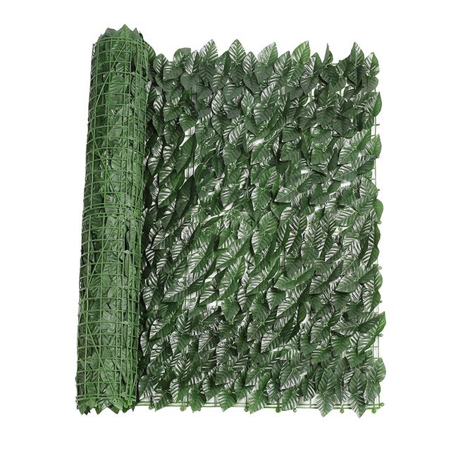 Artificial Trellis Privacy with Yard featuring a pre-fabricated panel with green artificial leaves attached to a mesh backing. The roll measures 50x300cm (19.65x117.9 inches) and is designed for easy installation on fences, walls, or balconies. Ideal for enhancing privacy in outdoor spaces such as backyards, terraces, or commercial areas. Made from durable materials, it resists fading and allows air circulation while blocking strong sunlight.