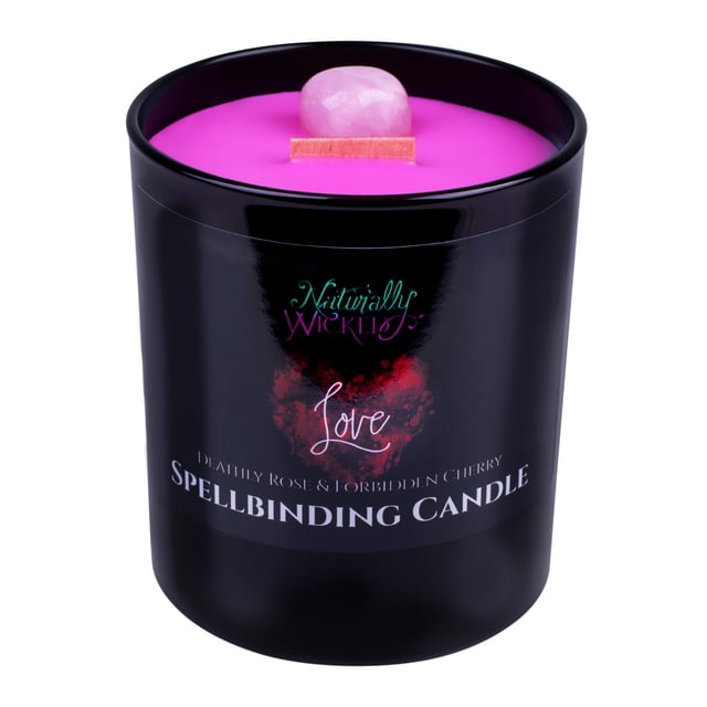 Naturally Wicked Spellbinding Love Candle featuring deep pink wax with a Rose Quartz crystal embedded at the center. The candle is housed in a sleek black jar with 'Deathly Rose & Forbidden Cherry' scent branding. It includes a crackling wooden wick and is handcrafted from natural plant wax. Paired with a luxury iridescent gift box and a multi-language book of love spells, this candle is designed for romantic rituals and emotional connection.