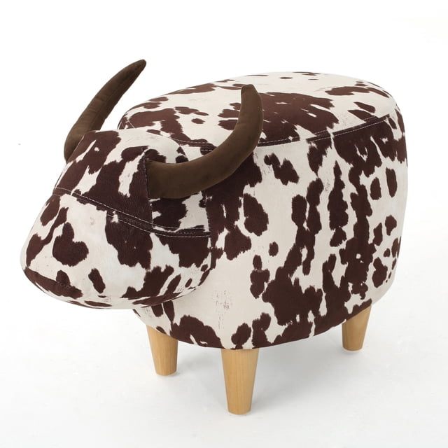 Christopher Knight Home Bessie Patterned Velvet Cow Ottoman, a unique ottoman with a brown milk cow design and natural wooden legs. The cow-shaped silhouette features soft velvet upholstery and realistic horn accents, ideal for living room seating or decor.